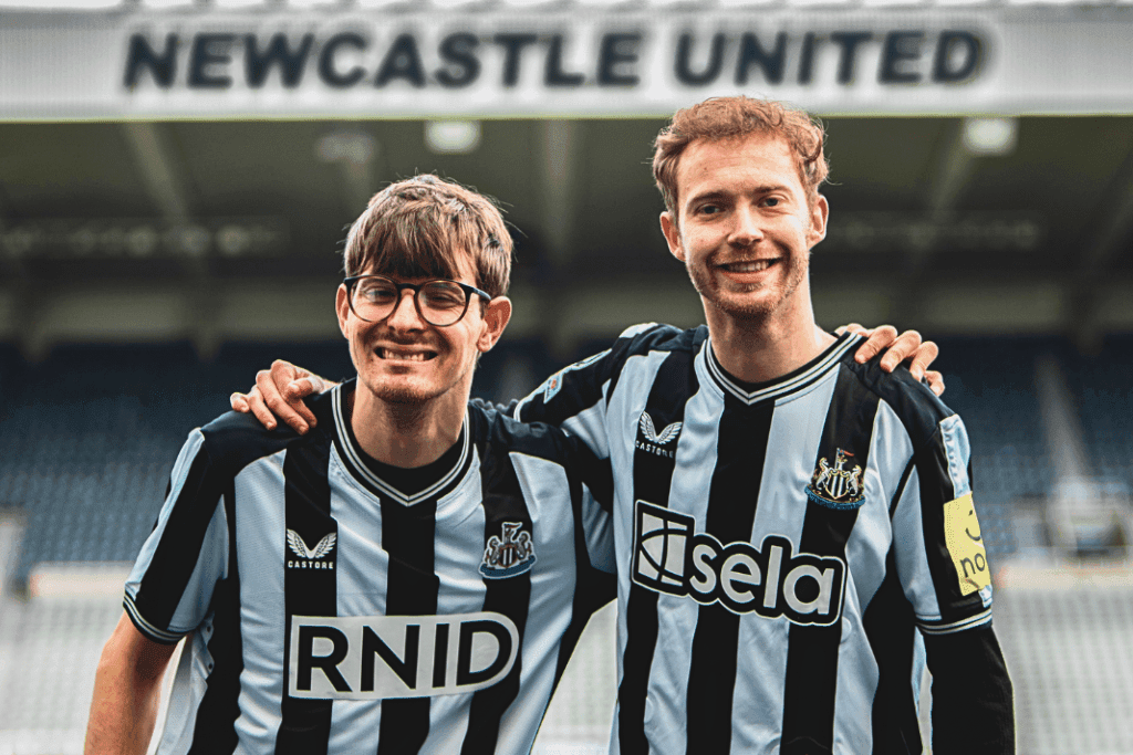 Newcastle United fans wearing Sela’s haptic shirts Fans wearing Newcastle’s haptic shirts feel the game’s excitement through vibrations. As the news of Newcastle United’s pioneering initiative spreads, it ignites a spark of hope and excitement not just among the deaf and hard-of-hearing community but across the global sports fraternity.